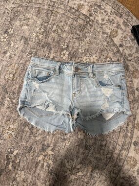 eunina Light Blue Distressed Denim Cutoff Shorts